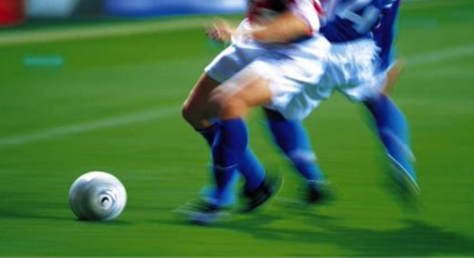 A picture containing grass, soccer, person, ball

Description automatically generated